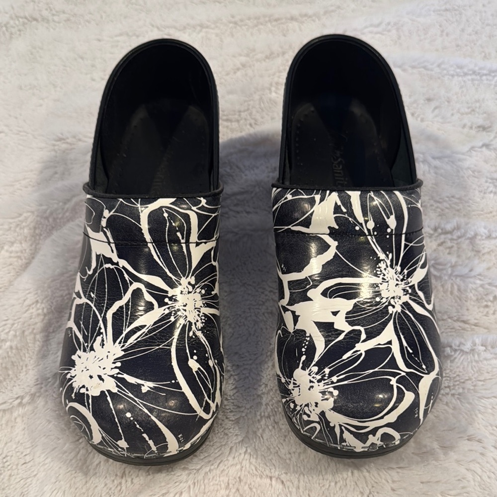 Black and white floral Sanita Clogs
